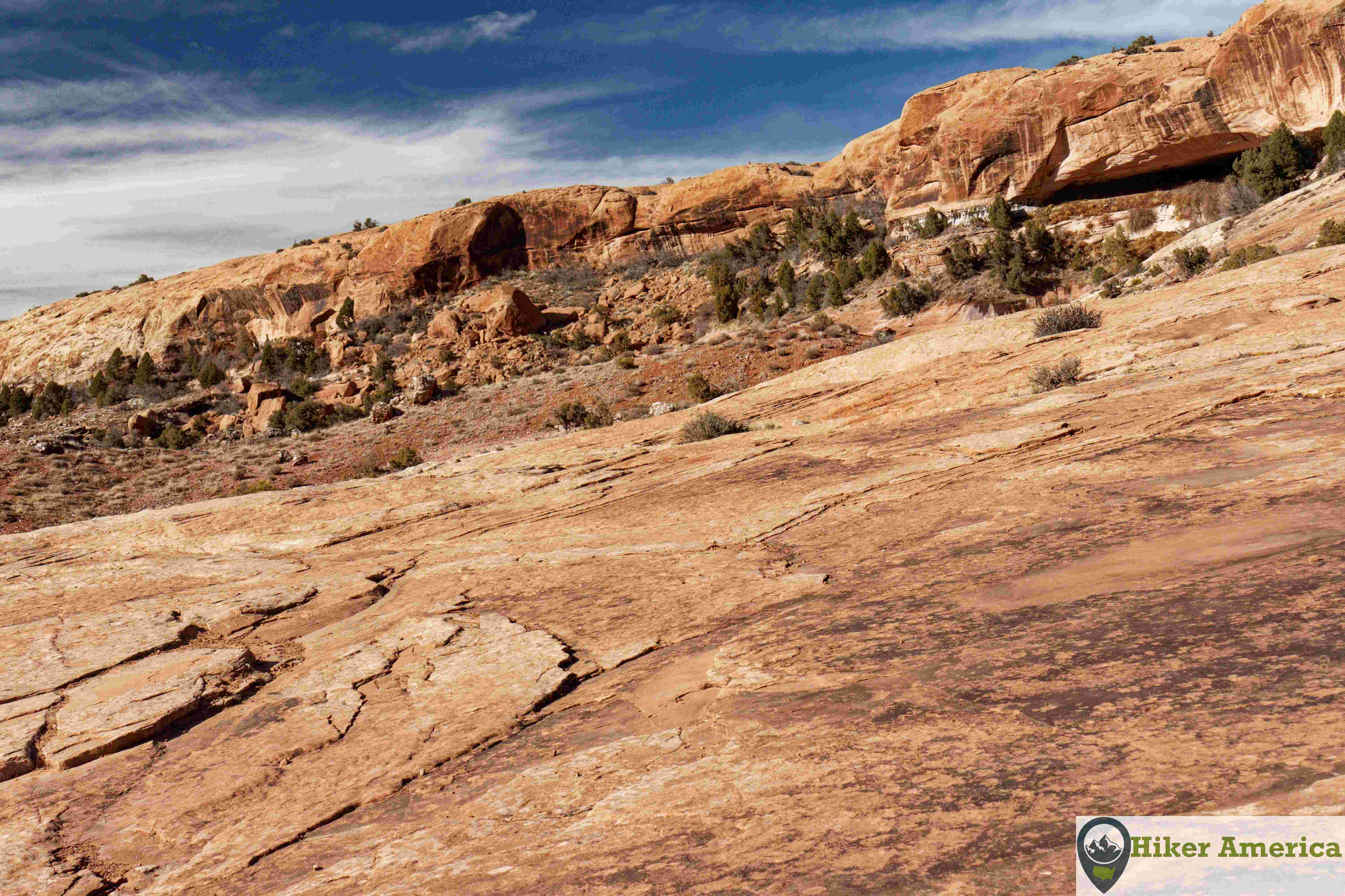A nice view of the cliff line with slickrock in the foreground. 